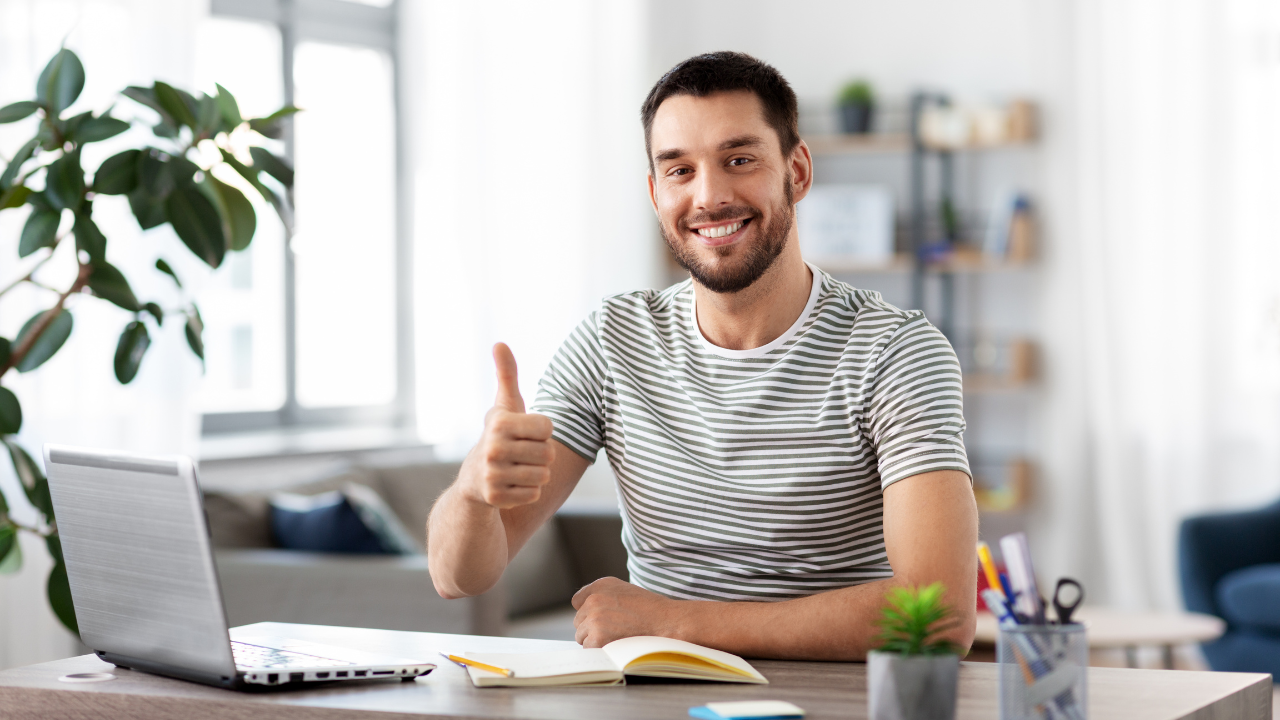 man showing his thumb up