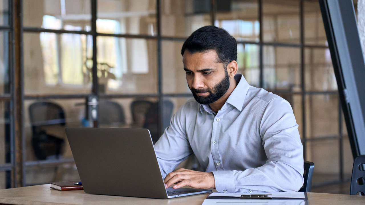 Indian Business Man using laptop