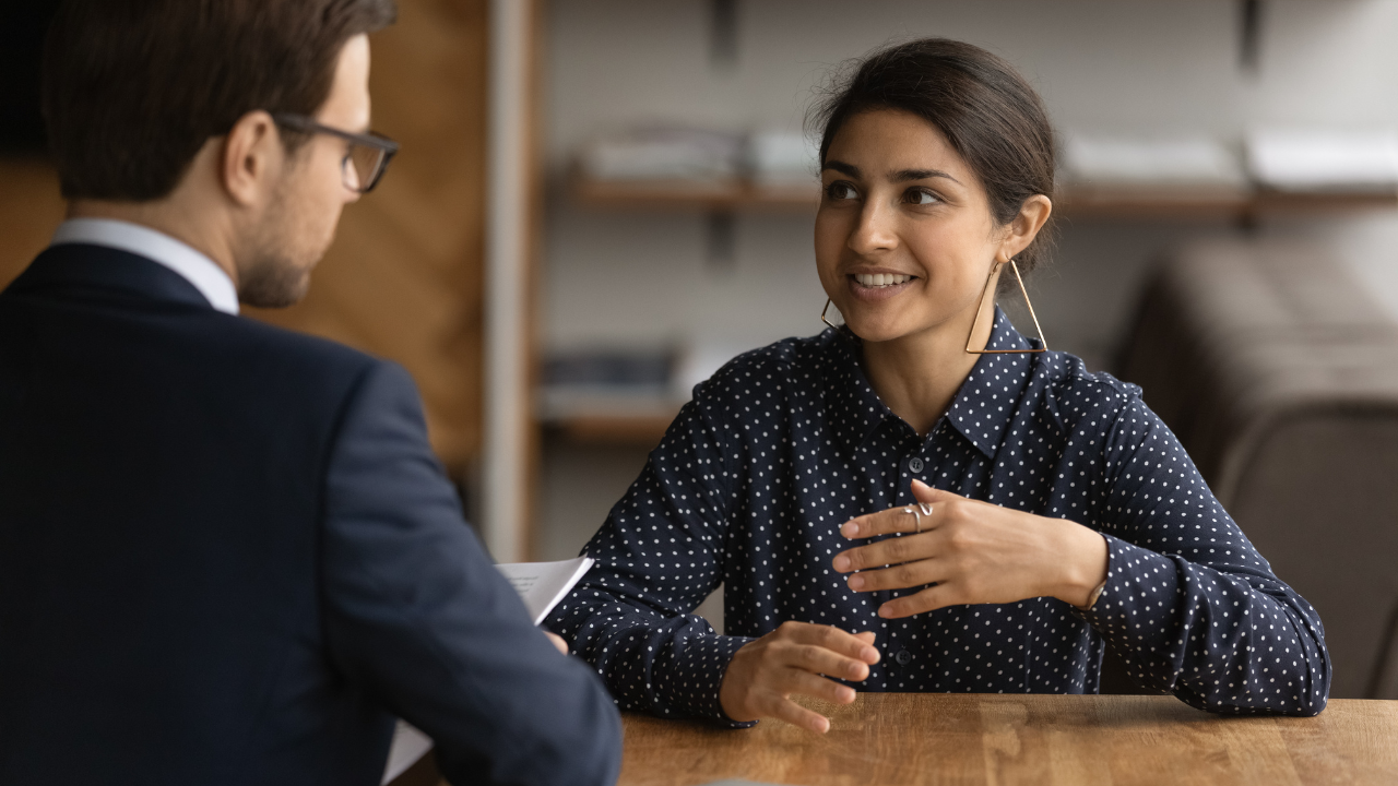 Confident Indian woman talking