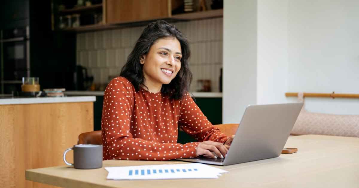 relaxed Indian woman with laptop